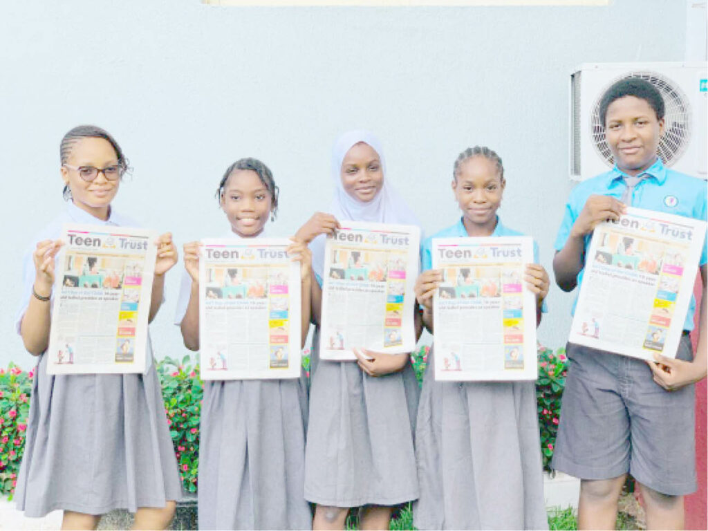 Students of Lagooz Schools, Lagos with copies of Teen Trust