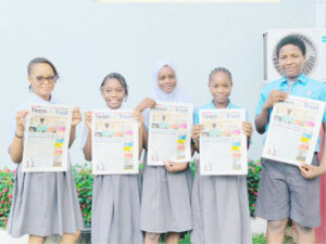 Students of Lagooz Schools, Lagos with copies of Teen Trust